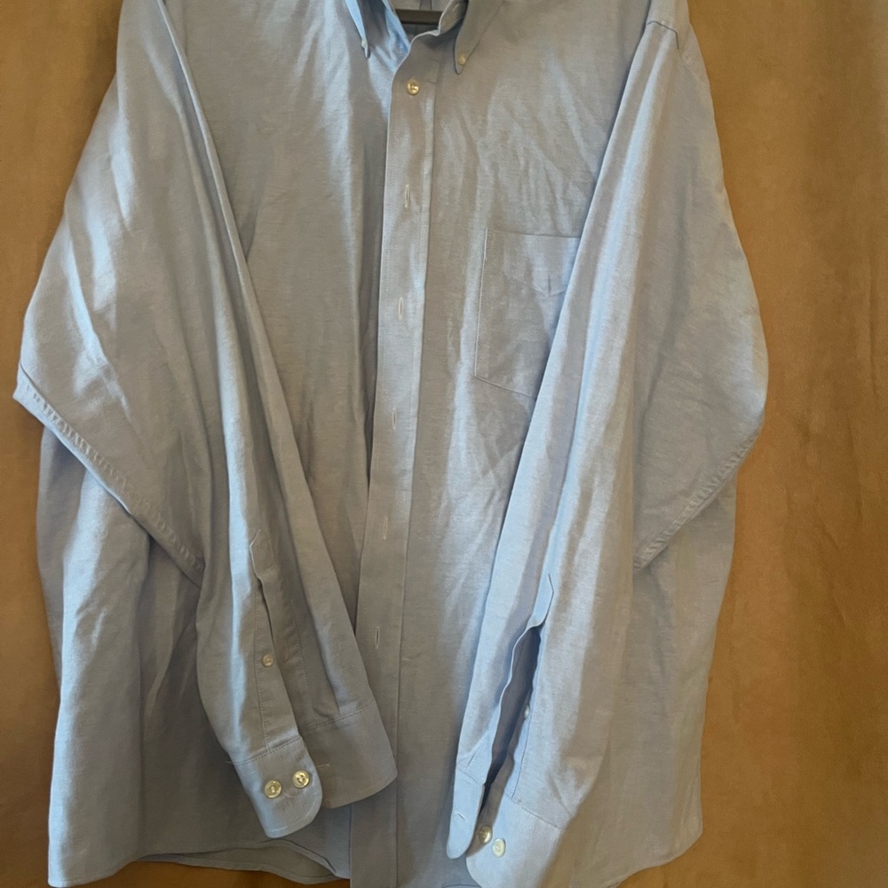 Arrow men’s light blue button down dress shirt.